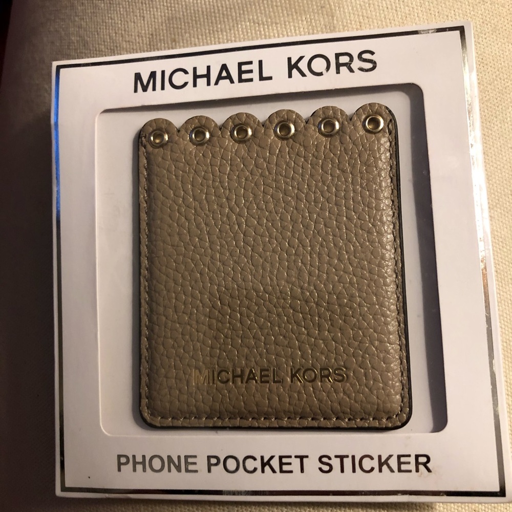 (1) Michael Kors Phone Pocket Card Holder ( New in Package)